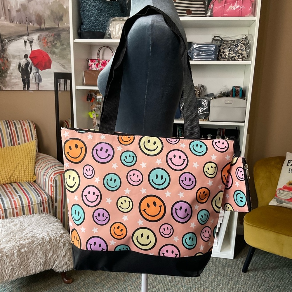 Happy Vibes NGIL Canvas Tote Bag with zip closure & matching coin purse.
NWOT!